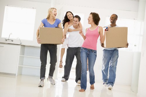 Moving van and team preparing a Kensington home relocation on a narrow residential street