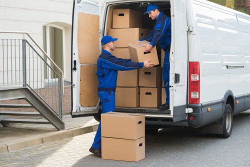 Removal van with recyclable items sorted for reuse in Kensington