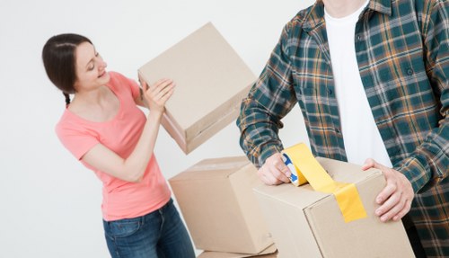 Office relocation preparation in Kensington with labelled equipment and furniture