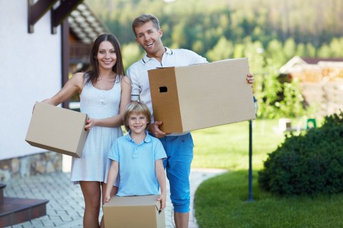 A removals team navigating tight access in Kensington
