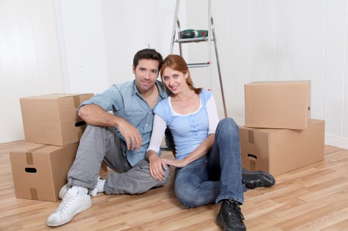 Packed boxes and furniture loaded into a moving van