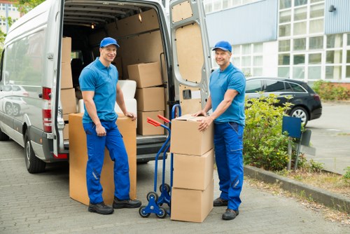 Man with a van assisting a small business move in Kensington