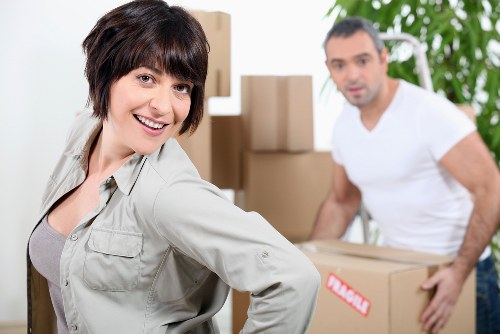 Staff carrying out a risk-aware packing and lifting process