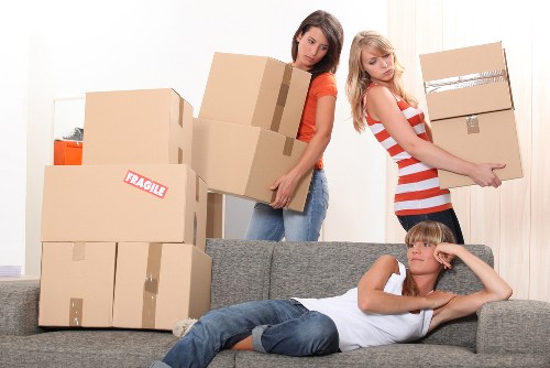 Professional Kensington movers handling household belongings with care